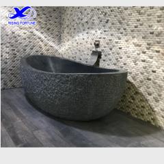 bañera ovalada de piedra natural