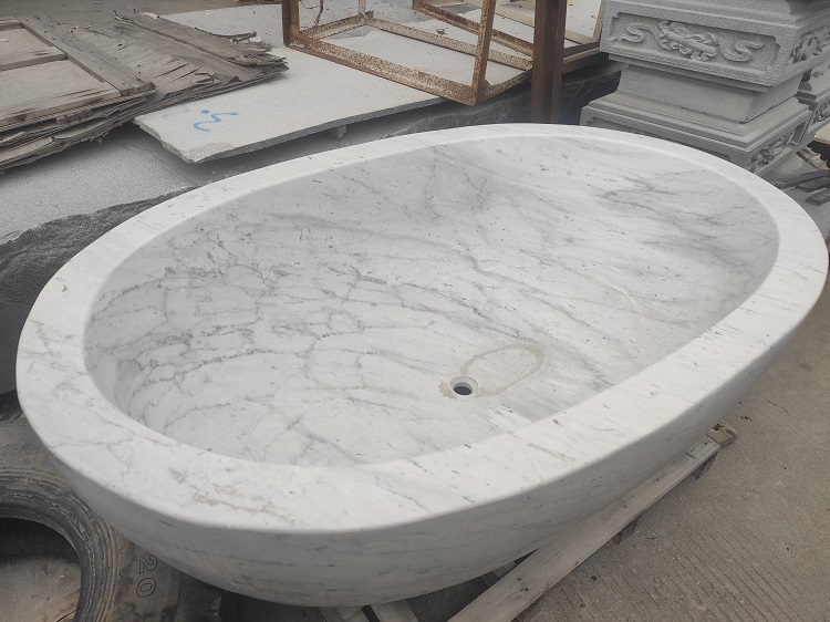 bañera de piedra de mármol