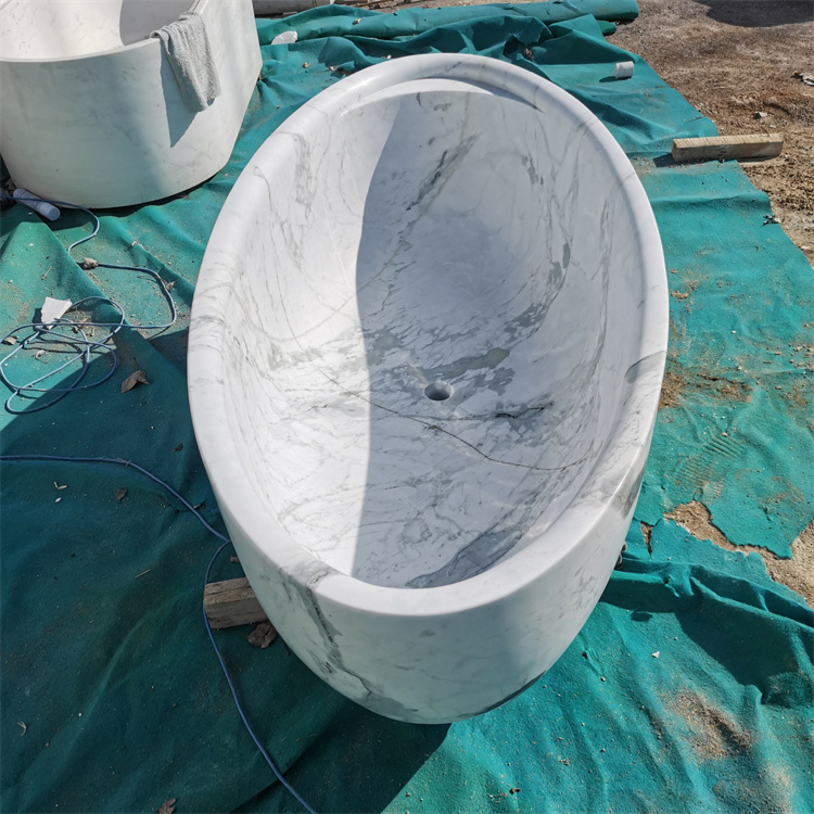 white marble bath tub