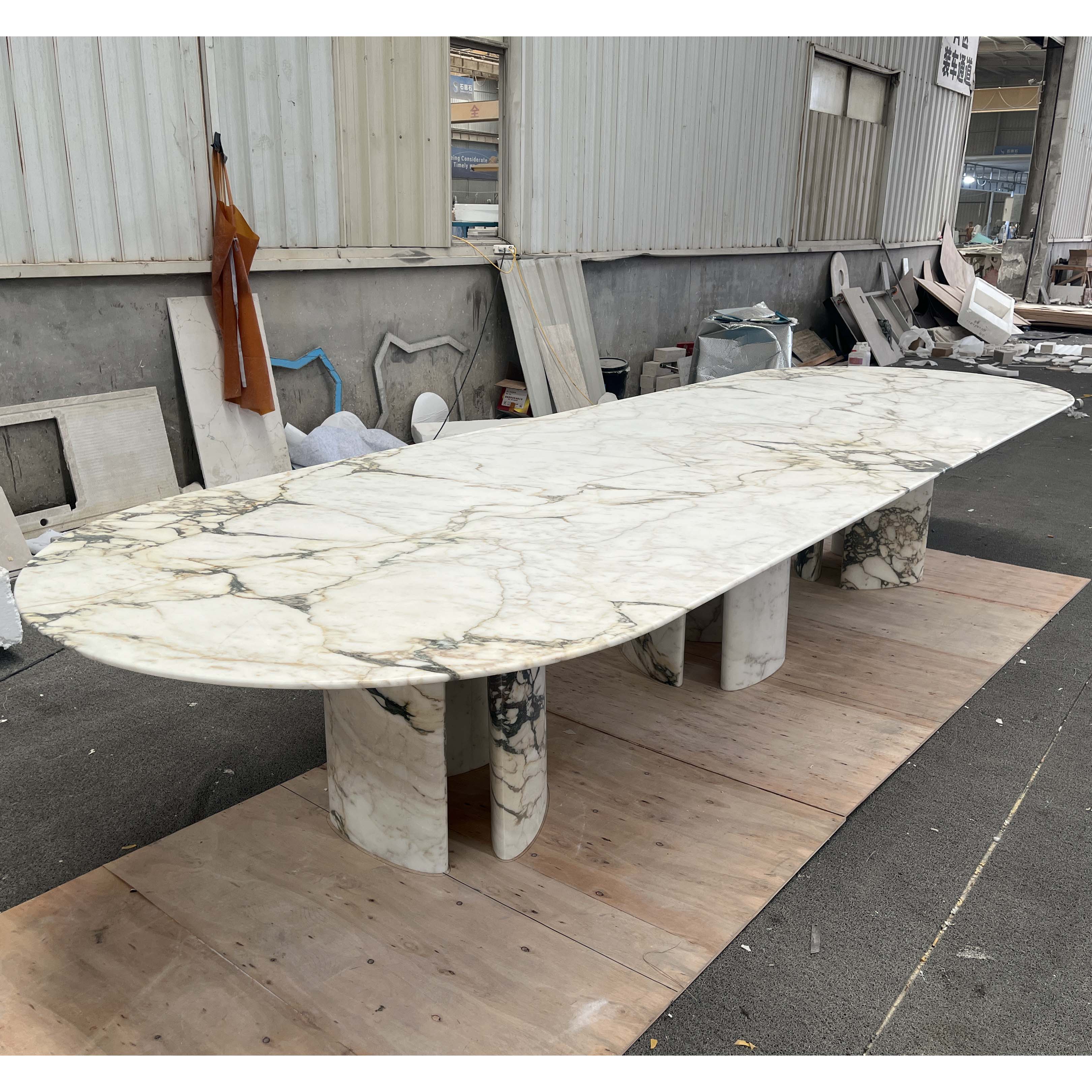 Calacatta Viola marble oval dining table