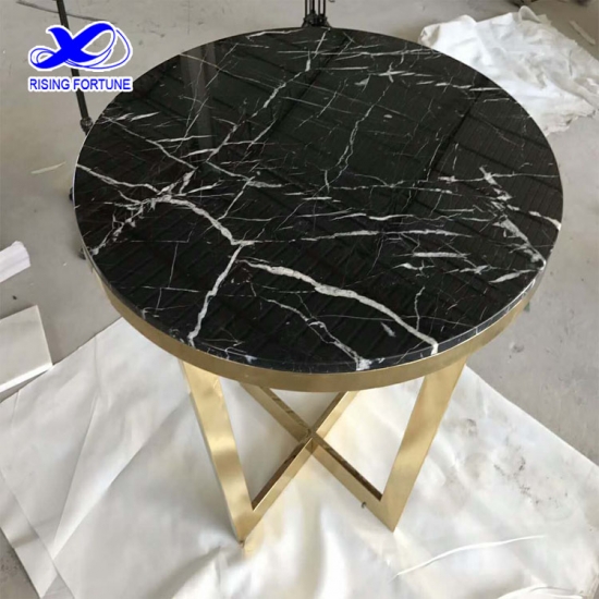 mesa de centro redonda de mármol con patas de metal