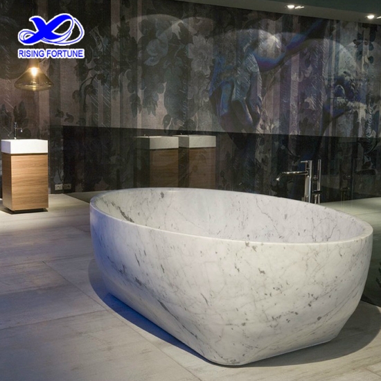 bañera independiente ovalada de mármol blanco