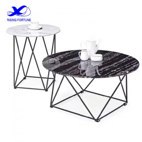 mesa de centro redonda de mármol con patas de hierro