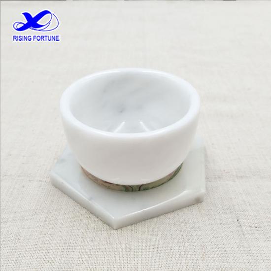 taza de té redonda de mármol blanco pulido