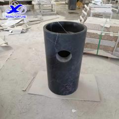 Honed black marble barrel column pedestal basin