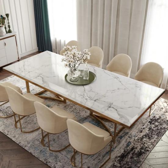 mesa de comedor de mármol con tablero rectangular blanco patas de acero inoxidable dorado
