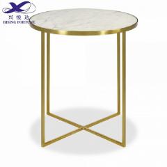 mesa de mármol con borde dorado
